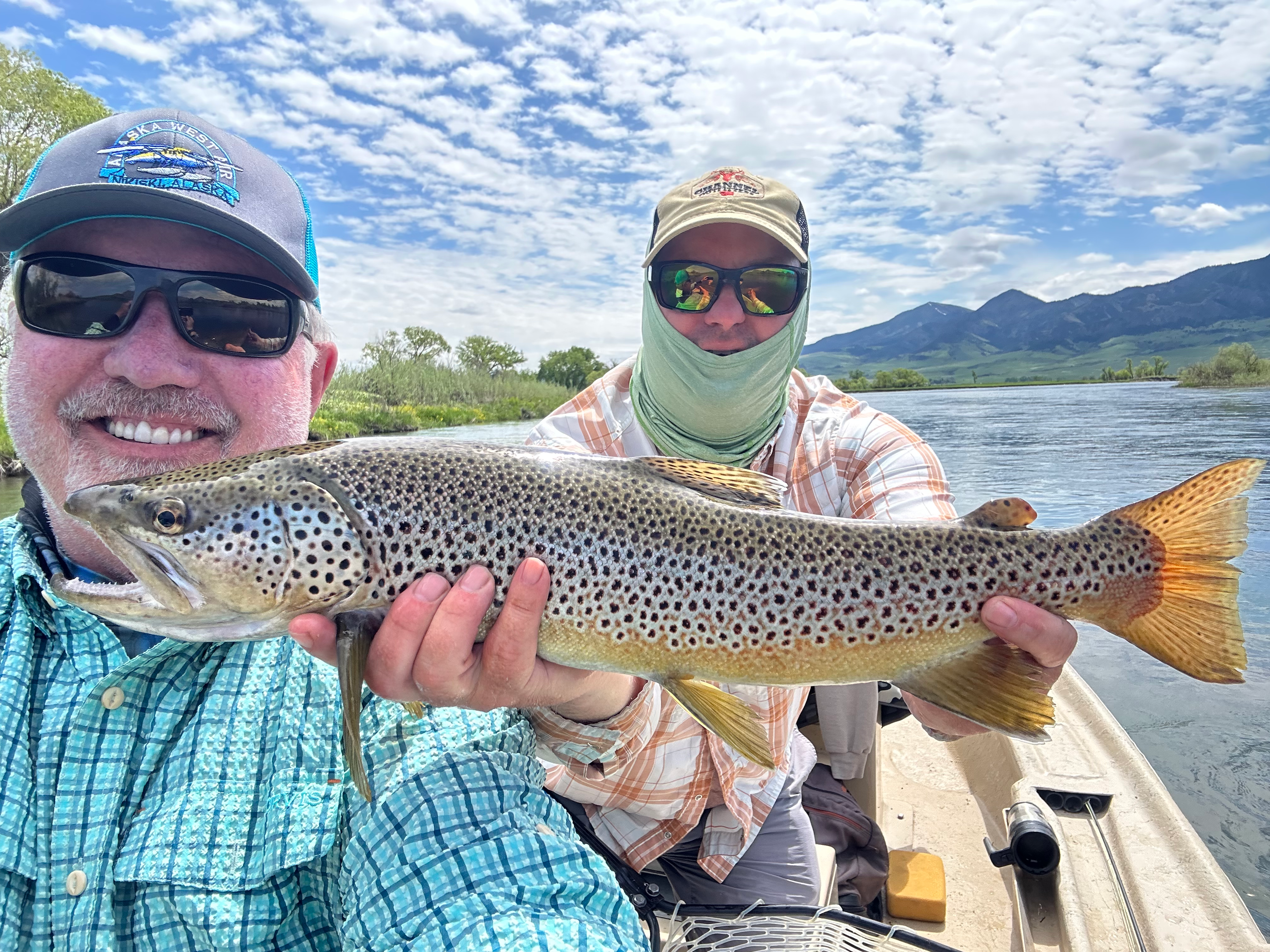 Gary holding second two footer for the day of fly fishing